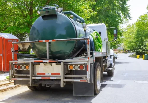 vacuum-waste-truck-on-the-cleaning-process-portabl-2025-03-27-06-09-40-utc(1)